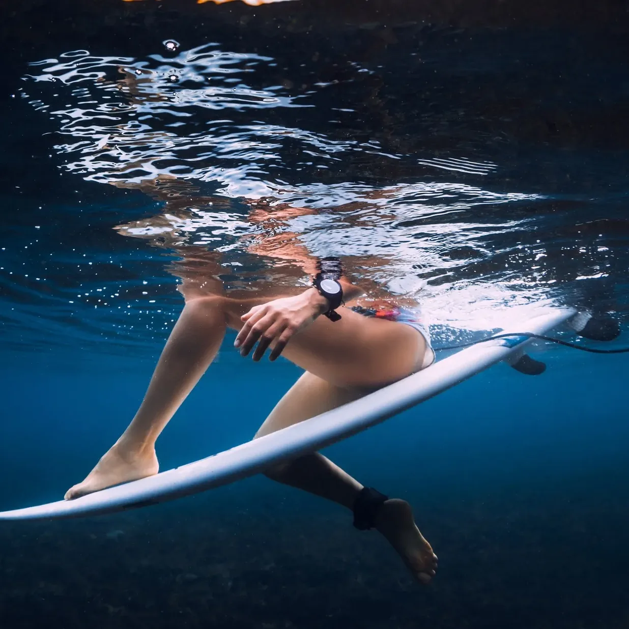 Surfer with smartwatch